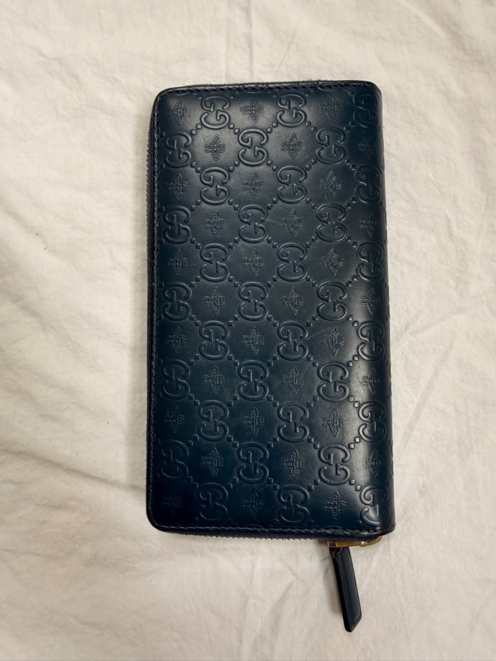 Gucci Embossed GG Zip-Around Wallet in Navy Blue
